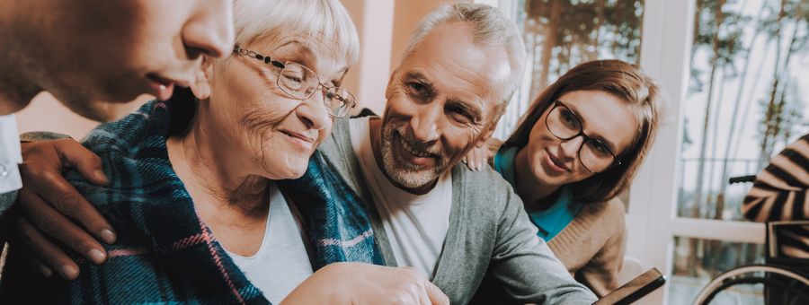 Family gathered together with a resident