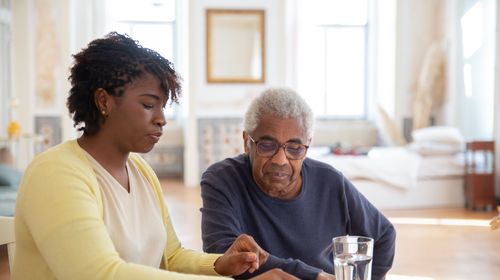 Caregiver assisting a resident