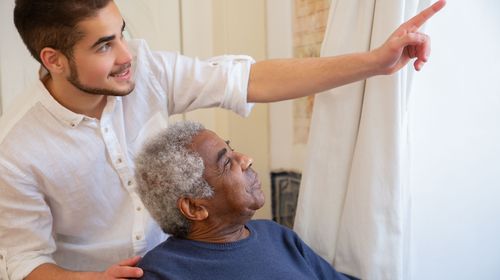 Caregiver spending time with a resident
